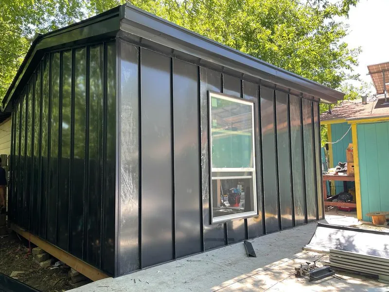 Black standing seam metal wall panels for Roof Inspection in East Lake-Orient Park