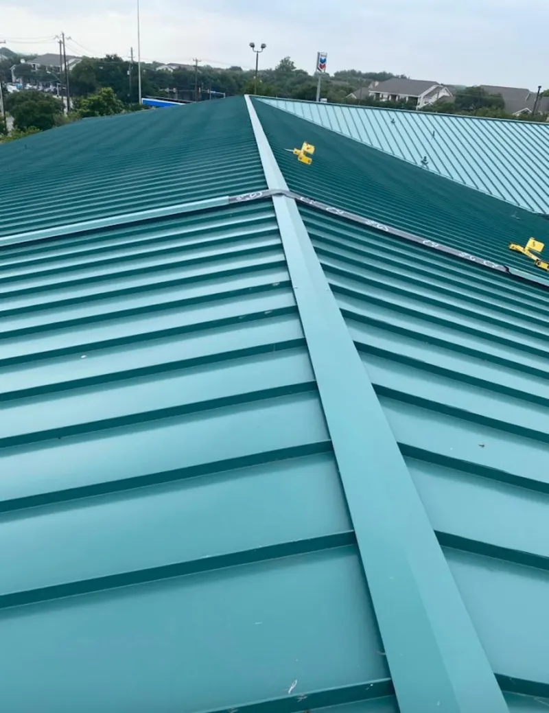 Green commercial metal roof ridge and valley for Metal Roof Repair in East Lake-Orient Park